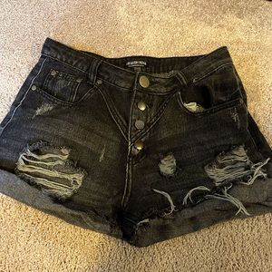 Black jean shorts frayed, size medium. But fits like a small, worn once.